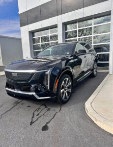 2025 Cadillac Escalade IQ Luxury 1 front view in Black Raven color